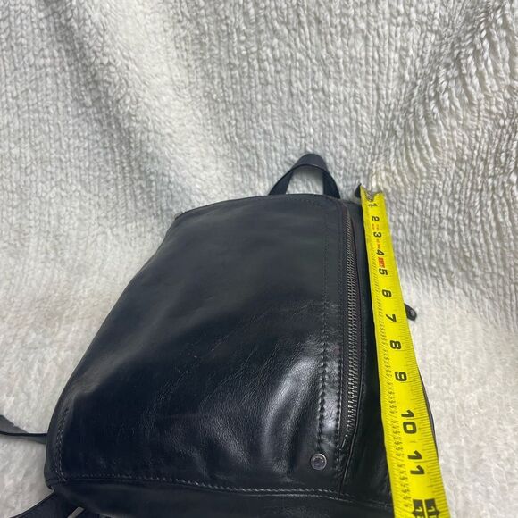 Tignanello Black Leather small Backpack with silver tone hardwares.